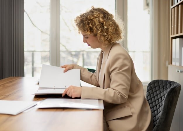 A person sitting at a desk, reviewing financial documents with a certified financial planner. The planner is pointing to a graph illustrating the projected growth of long-term care costs, while the person is taking notes and asking questions. The image conveys the importance of professional financial advice and planning.