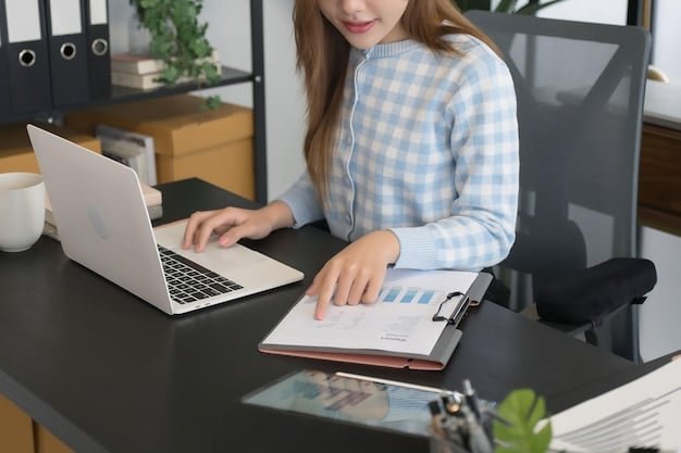 A freelancer meticulously organizing receipts and invoices in a file folder, with a laptop showing accounting software in the background, suggesting efficient expense tracking.