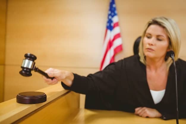 A gavel hitting a sounding block in a courtroom, symbolizing the legal process involved in debt collection and the statute of limitations.