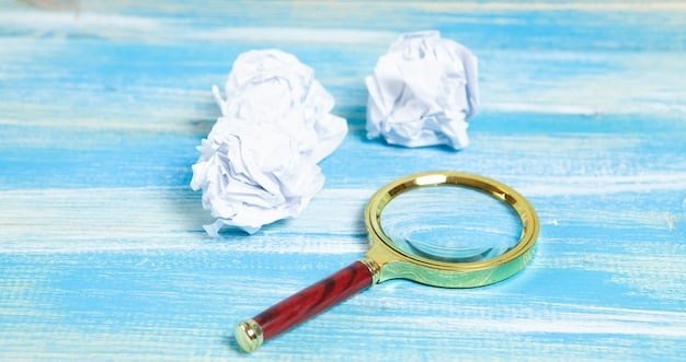 A magnifying glass over a document labeled 